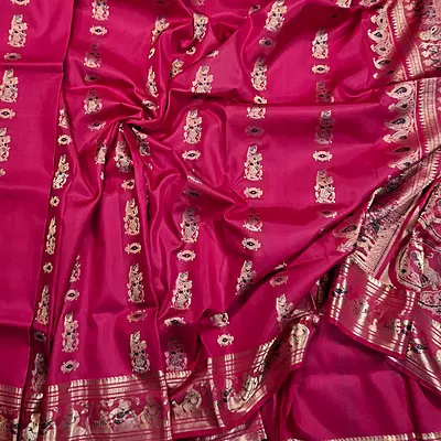Rani pink pure Mulberry silk Swarnachari saree. Rani pink pure Mulberry silk Swarnachari saree.