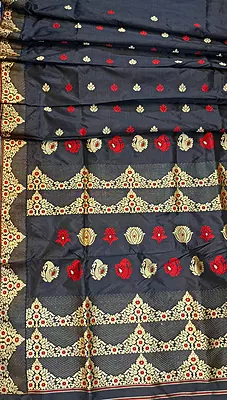 Assam Paat Silk Saree in Jet black with Woven red and dark beige Motifs Assam Paat Silk Saree in Jet black with Woven red and dark beige Motifs