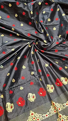 Assam Paat Silk Saree in Jet black with Woven red and dark beige Motifs Assam Paat Silk Saree in Jet black with Woven red and dark beige Motifs