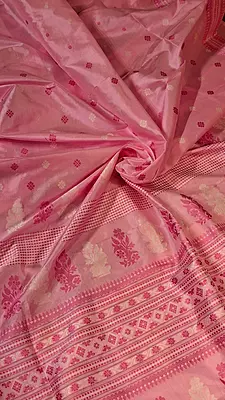 Assam Paat Silk Saree in Pastel Pink with Woven dark pink and white Motifs Assam Paat Silk Saree in Pastel Pink with Woven dark pink and white Motifs