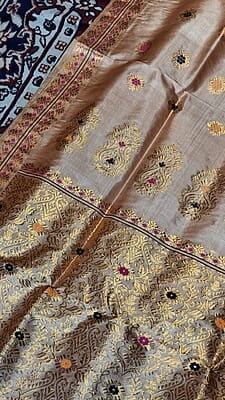 Premium Assam Tussar by Tussar Saree with Goona Zari & Three-Colour Meena Work Premium Assam Tussar by Tussar Saree with Goona Zari & Three-Colour Meena Work