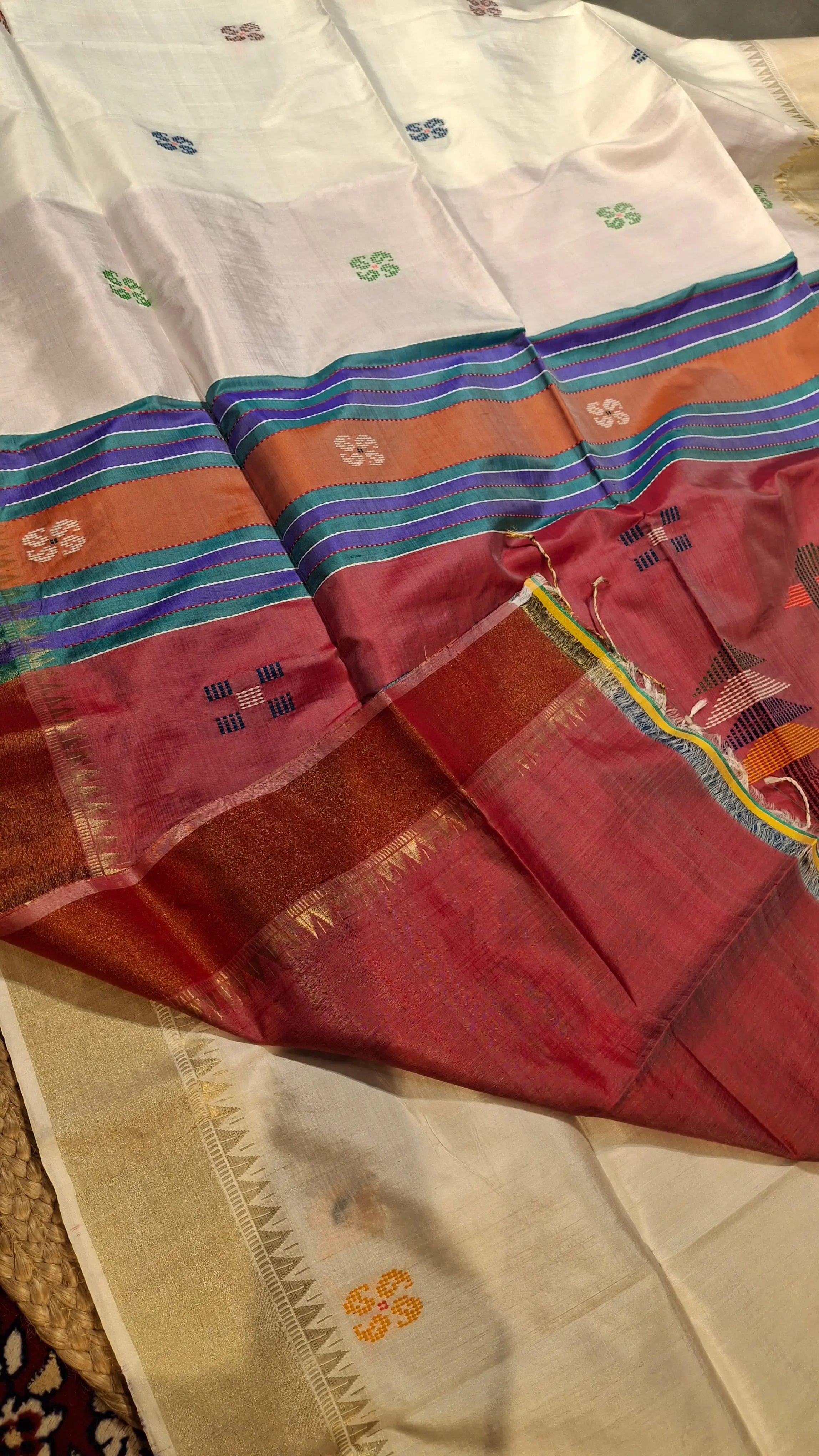 Colour white body golden zari Kalachestra saree with maroon pallu
