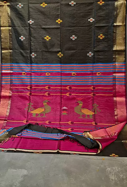 Colour jet black body, golden zari Kalashetra saree with contrast rani pink pallu