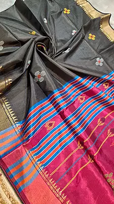 Colour jet black body, golden zari Kalashetra saree with contrast rani pink pallu