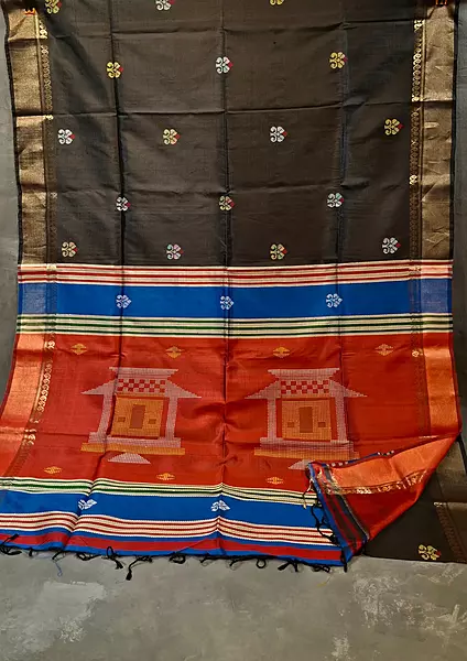 Jet black body with golden zari and contrast rust orange pallu Kalashetra saree