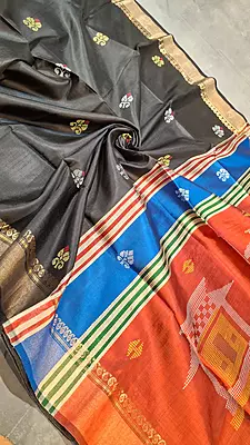 Jet black body with golden zari and contrast rust orange pallu Kalashetra saree