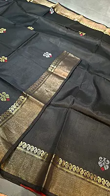 Jet black body with golden zari and contrast rust orange pallu Kalashetra saree