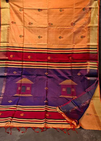 Dark peach body, golden zari Kalashetra saree with Royal blue pallu