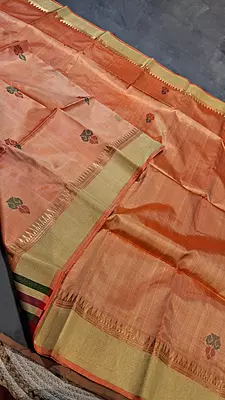 Dark peach body, golden zari Kalashetra saree with Royal blue pallu