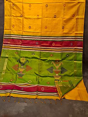 Colour turmeric yellow body, golden zari Kalashetra saree with parrot green pallu