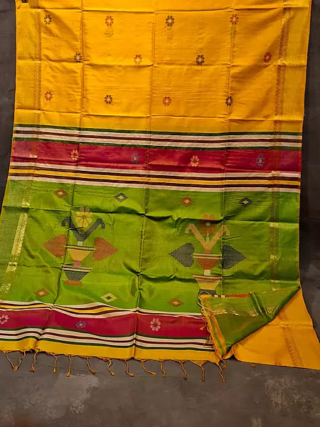 Colour turmeric yellow body, golden zari Kalashetra saree with parrot green pallu