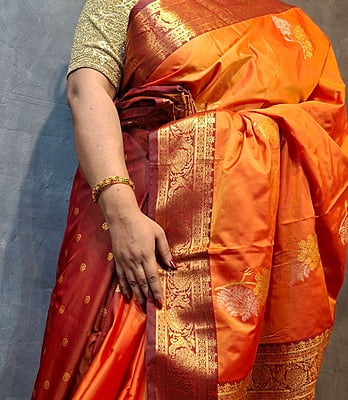 Bright Orange Semi Silk Saree with Maroon Border & Rich Gold Zari Weaving Bright Orange Semi Silk Saree with Maroon Border & Rich Gold Zari Weaving