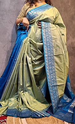 Pistachio Green Semi Silk Saree with Ferozi Border & Woven Zari Detailing Pistachio Green Semi Silk Saree with Ferozi Border & Woven Zari Detailing