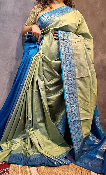 Pistachio Green Semi Silk Saree with Ferozi Border & Woven Zari Detailing Pistachio Green Semi Silk Saree with Ferozi Border & Woven Zari Detailing