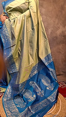 Pistachio Green Semi Silk Saree with Ferozi Border & Woven Zari Detailing Pistachio Green Semi Silk Saree with Ferozi Border & Woven Zari Detailing