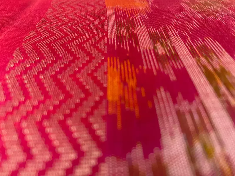 Teal green silk saree with silver buttas with pochampally pink pallu