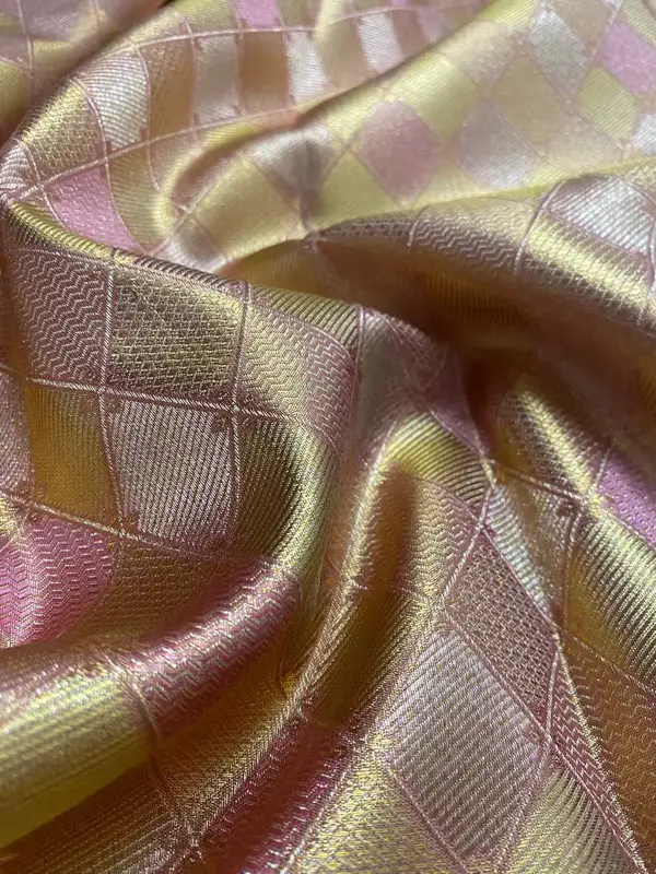 Peach orange Kanjivaram silk saree with zari border