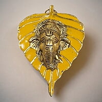 Mini Enamel Leaf Ganesh Yellow color Aluminium Idol Mini Enamel Leaf Ganesh Yellow color Aluminium Idol