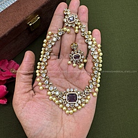 Single centered stone with beads