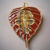 Mini Enamel Leaf Ganesh Red color Aluminium Idol Mini Enamel Leaf Ganesh Red color Aluminium Idol