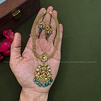 Lakshmi attigai with green beads
