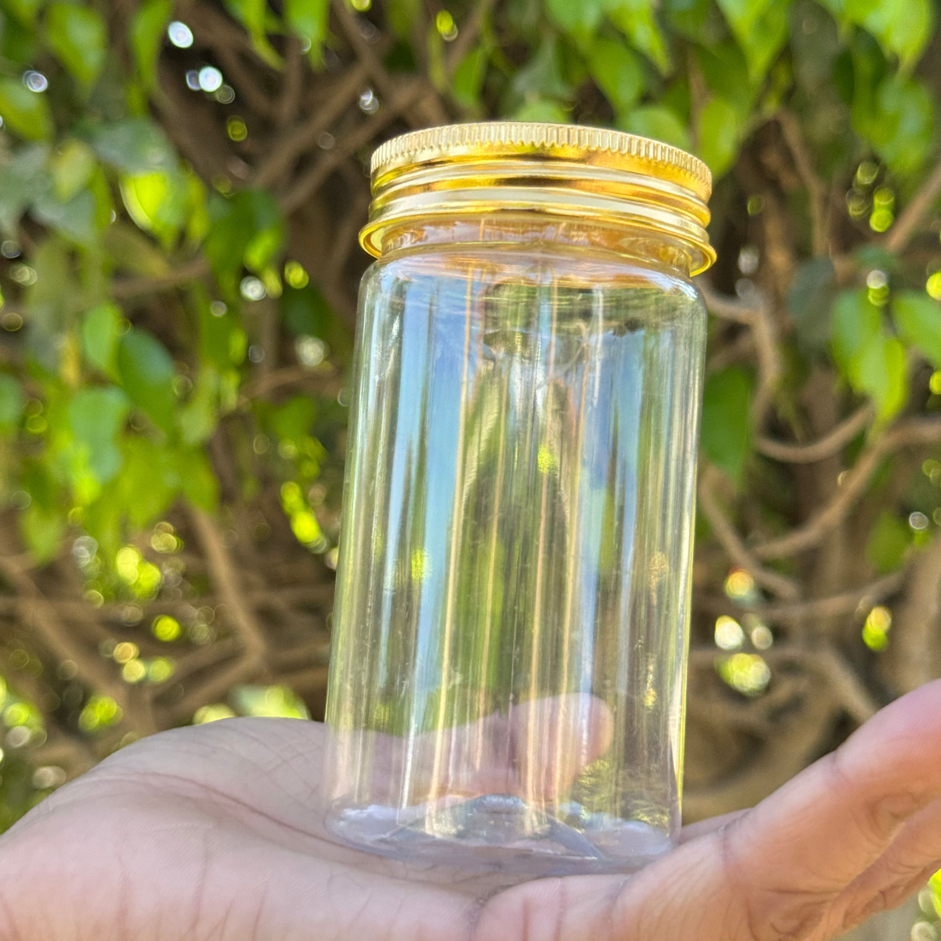 200ml Round PET Jar + 53mm Aluminium Gold Cap 200ml Round PET Jar + 53mm Aluminium Gold Cap