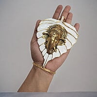 Mini Enamel Leaf Ganesh White color Aluminium Idol Mini Enamel Leaf Ganesh White color Aluminium Idol