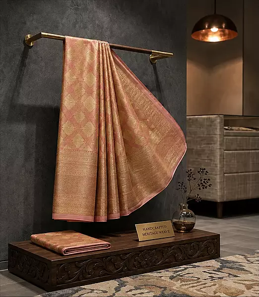 Peach orange Kanjivaram silk saree with zari border