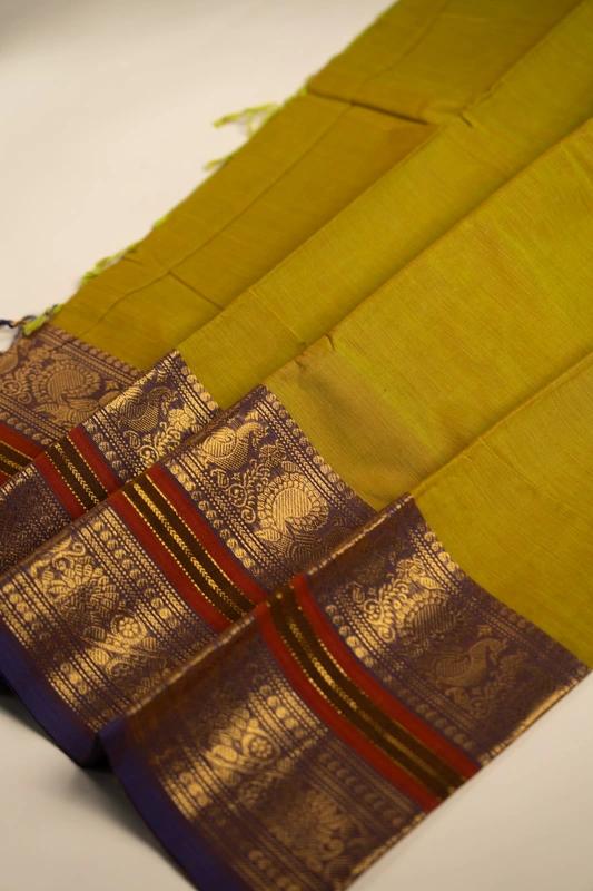 Kanchi Cotton plain body - Pista Green with Broad and Narrow Violet border
