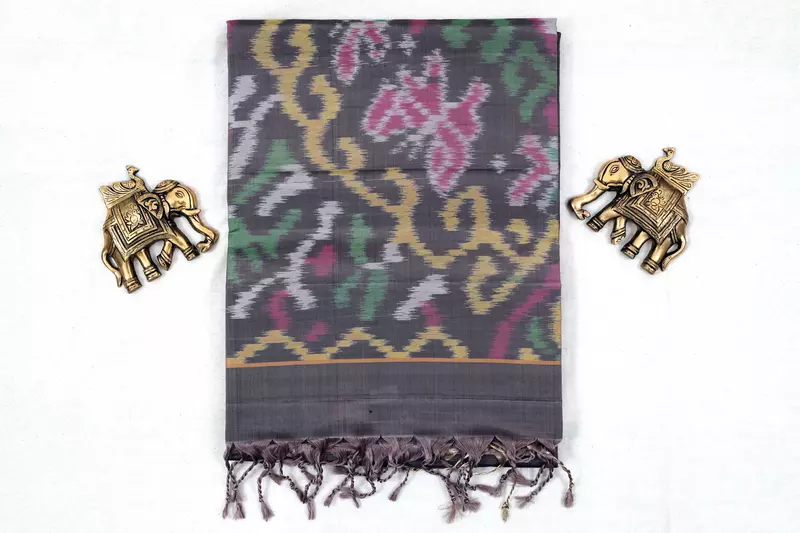 Pastel charcoal grey ikat silk saree with ikat blouse