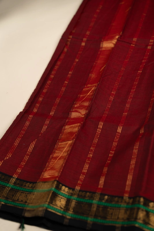 Kanchi Cotton plain body - Maroon Saree with Black Heritage Border and Antique Gold Zari
