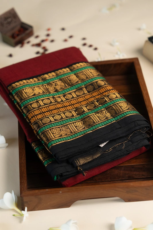 Kanchi Cotton plain body - Maroon Saree with Black Heritage Border and Antique Gold Zari