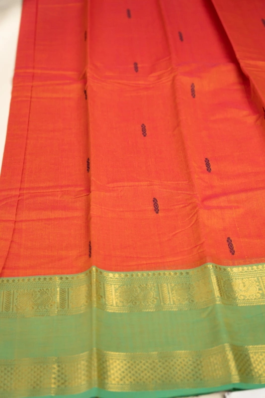 Kanchi Cotton body butta - Coral Orange Cotton Saree with Parrot Green Antique Gold Zari Bord