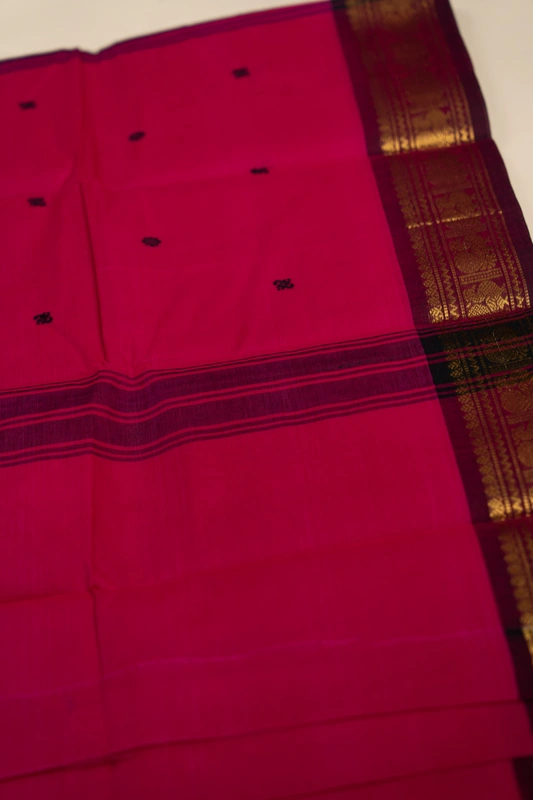 Kanchi Cotton body butta - Rani Pink Cotton Saree with Wine Purple Antique Gold Zari Border