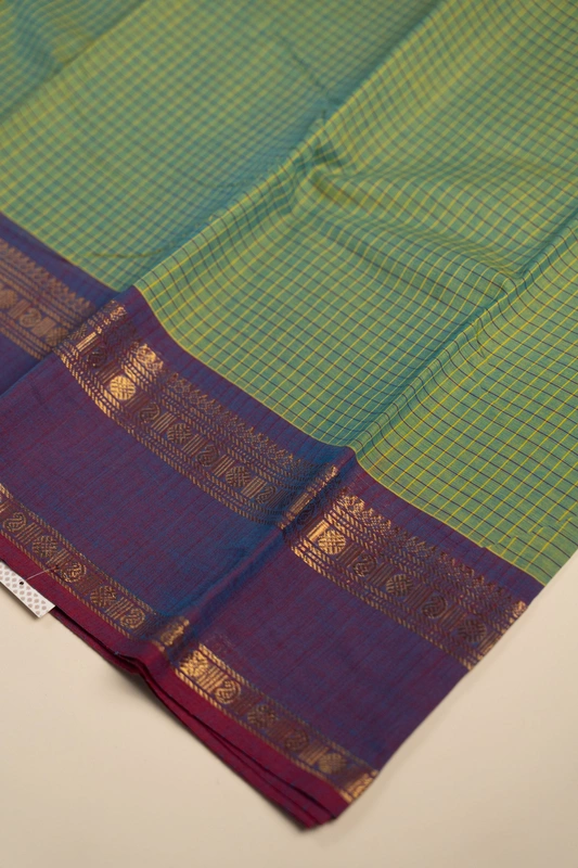 Kanchi Cotton body checks - Olive Green Checked Cotton Saree with Plum Purple Contrast Border