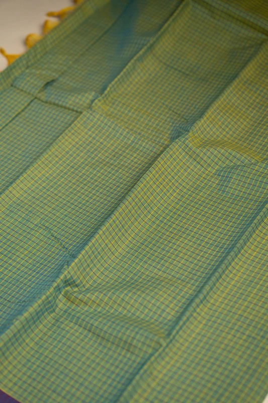Kanchi Cotton body checks - Olive Green Checked Cotton Saree with Plum Purple Contrast Border
