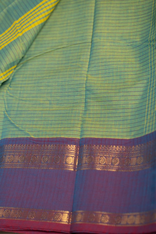 Kanchi Cotton body checks - Olive Green Checked Cotton Saree with Plum Purple Contrast Border
