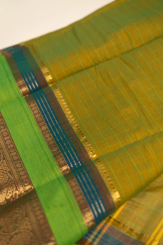 Kanchi Cotton body checks - Olive Green Checked Cotton Saree with Parrot Green Contrast Border