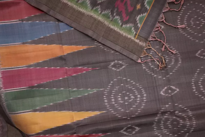 Pastel charcoal grey ikat silk saree with ikat blouse