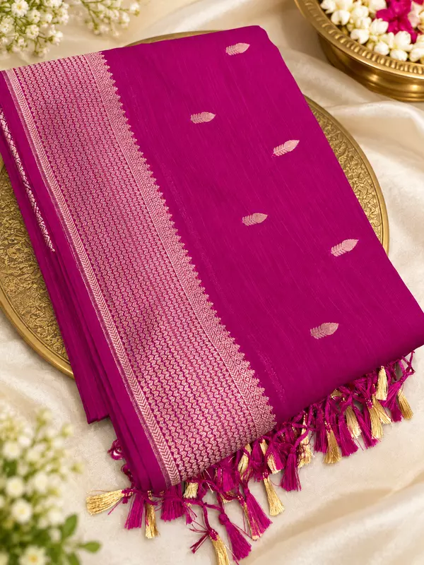 Fall in love with this gorgeous Mango Silk Saree, featuring a rich magenta shade with beautiful golden zari detailing