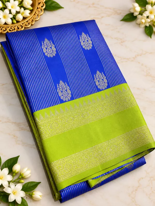 A beautiful Parrot Green Semi Soft Silk Saree featuring an elegant all-over hexagonal geometric jacquard pattern that gives the fabric a rich, textured appearance.