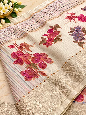 ? Ivory Floral Embroidery Saree
A graceful ivory saree featuring delicate multicoloured floral embroidery, beautifully highlighted with pink, magenta, mauve and purple floral motifs.