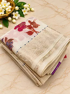 ? Ivory Floral Embroidery Saree
A graceful ivory saree featuring delicate multicoloured floral embroidery, beautifully highlighted with pink, magenta, mauve and purple floral motifs.