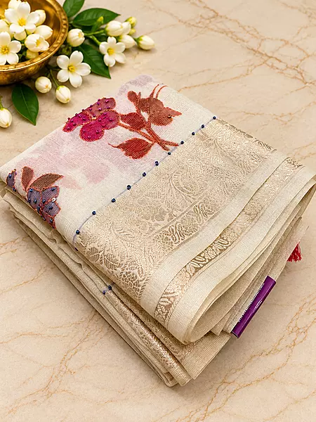 ? Ivory Floral Embroidery Saree

A graceful ivory saree featuring delicate multicoloured floral embroidery, beautifully highlighted with pink, magenta, mauve and purple floral motifs.