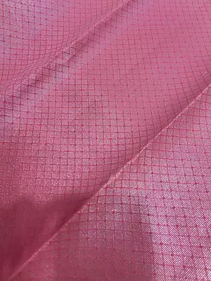 stunning ivory-gold Tissue Silk Saree featuring delicate pink paisley motifs beautifully scattered across the body.