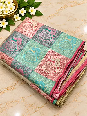 stunning ivory-gold Tissue Silk Saree featuring delicate pink paisley motifs beautifully scattered across the body.