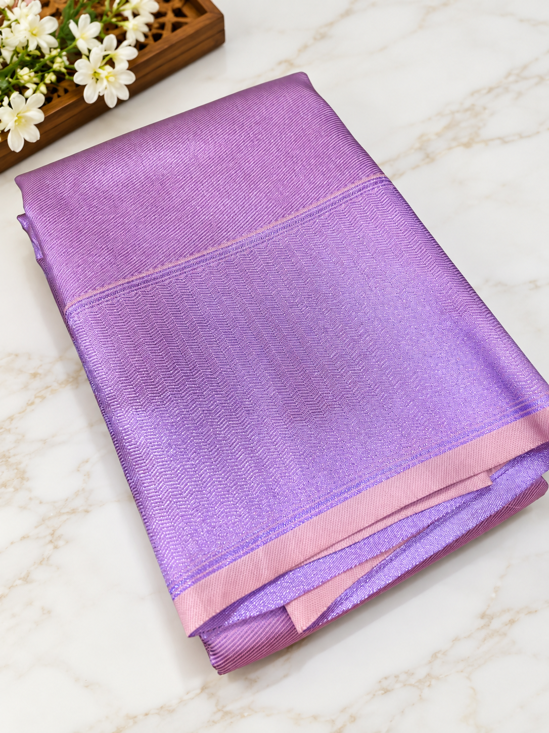 ? Lavender Lilac Silk Saree .A gorgeous pastel lavender lilac silk saree featuring an elegant all-over geometric zari jacquard pattern with a beautiful metallic sheen
