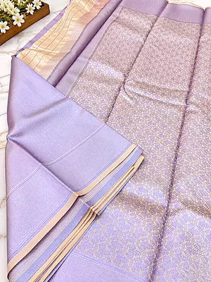 ? Lavender Lilac Silk Saree .A gorgeous pastel lavender lilac silk saree featuring an elegant all-over geometric zari jacquard pattern with a beautiful metallic sheen