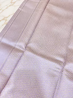 ? Lavender Lilac Silk Saree .A gorgeous pastel lavender lilac silk saree featuring an elegant all-over geometric zari jacquard pattern with a beautiful metallic sheen