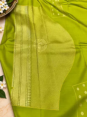 ? Lime Green Silk Saree – Description Make a statement with this vibrant lime green silk saree, crafted with a luxurious sheen and intricate gold zari weaving